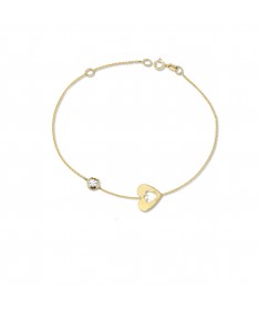 BRACCIALE CON CUORE TRAFORATO IN ORO GIALLO E PUNTO LUCE IN ORO BIANCO DIAMANTATO
